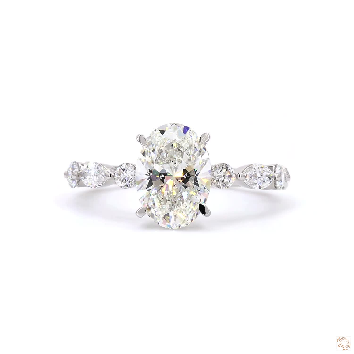 Oval-cut diamond set in a four-prong setting. | LR-395 (DA602251)