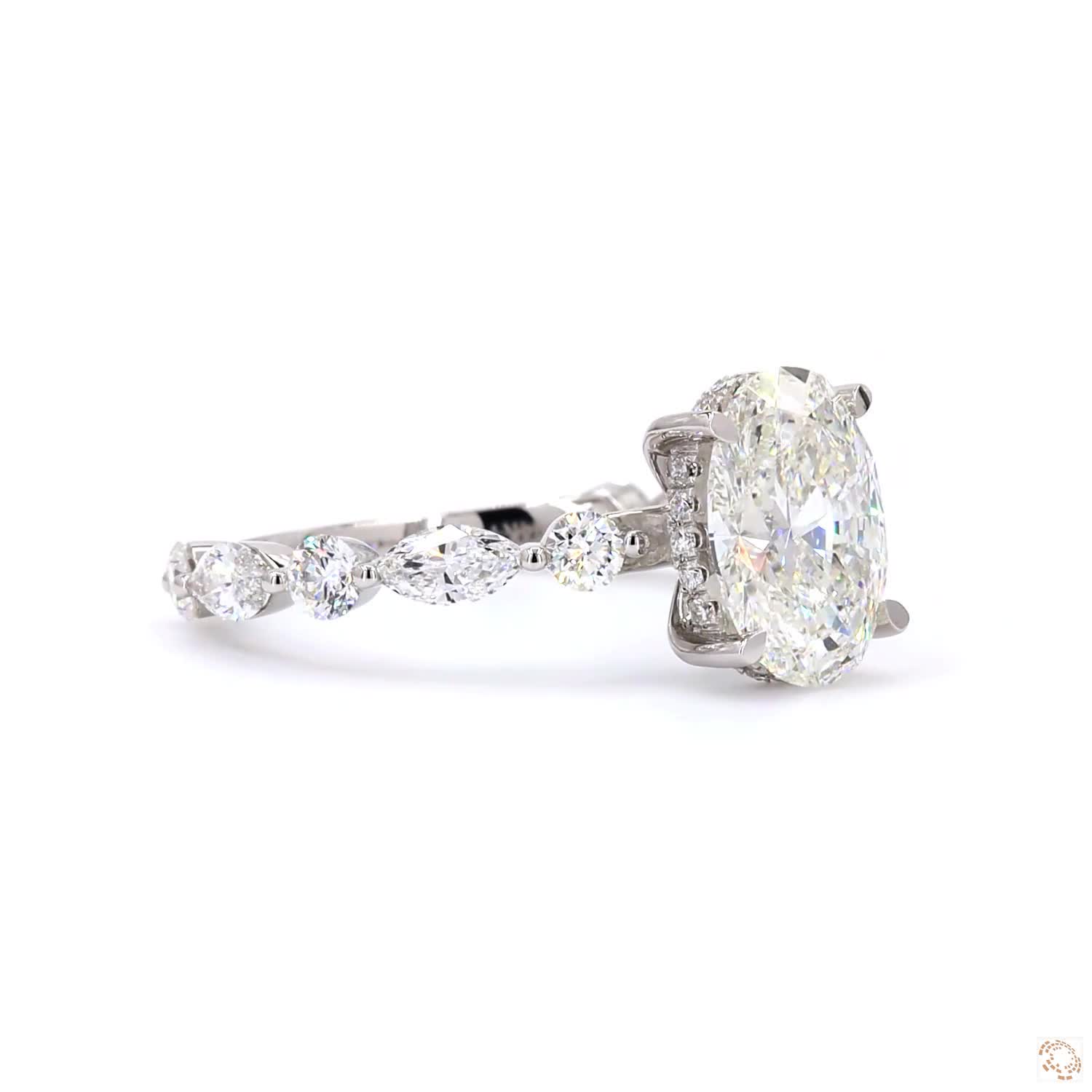 Oval-cut diamond set in a four-prong setting. | LR-395 (DA602251)