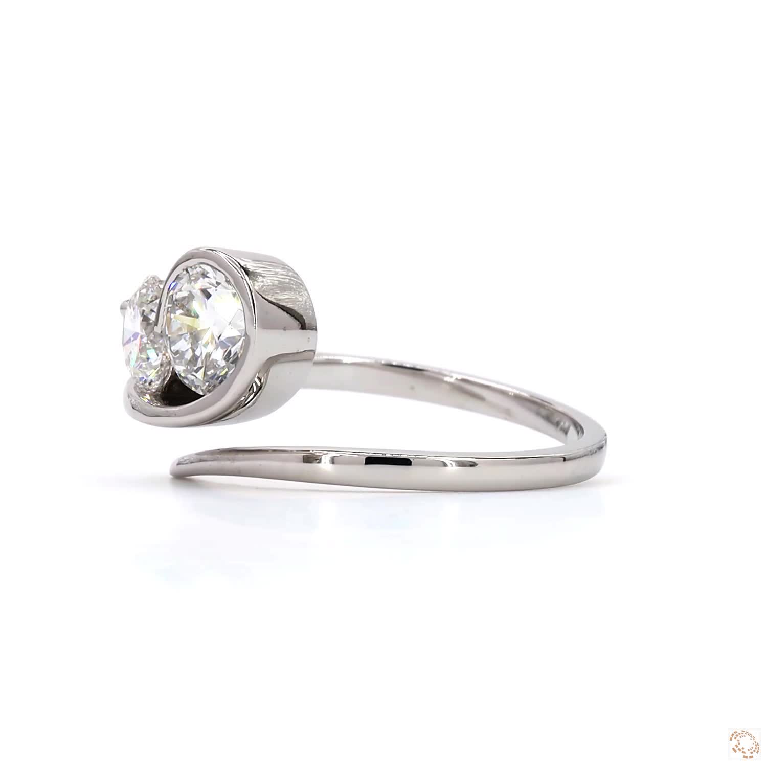 two brilliant round-cut diamonds set in a sleek white gold band | LR-392 (DA602246)